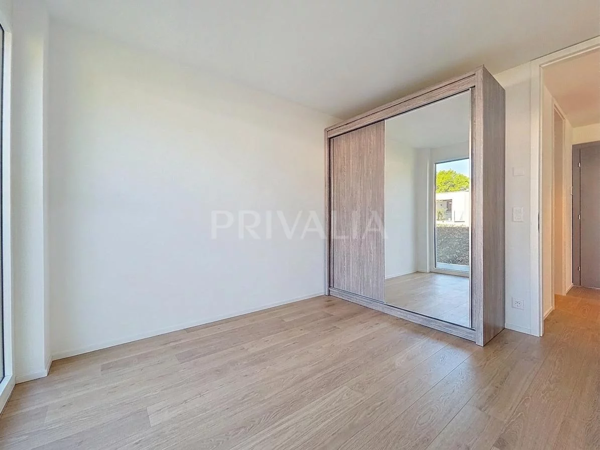 Bel appartement contemporain à deux pas du lac avec accès à une plage privée