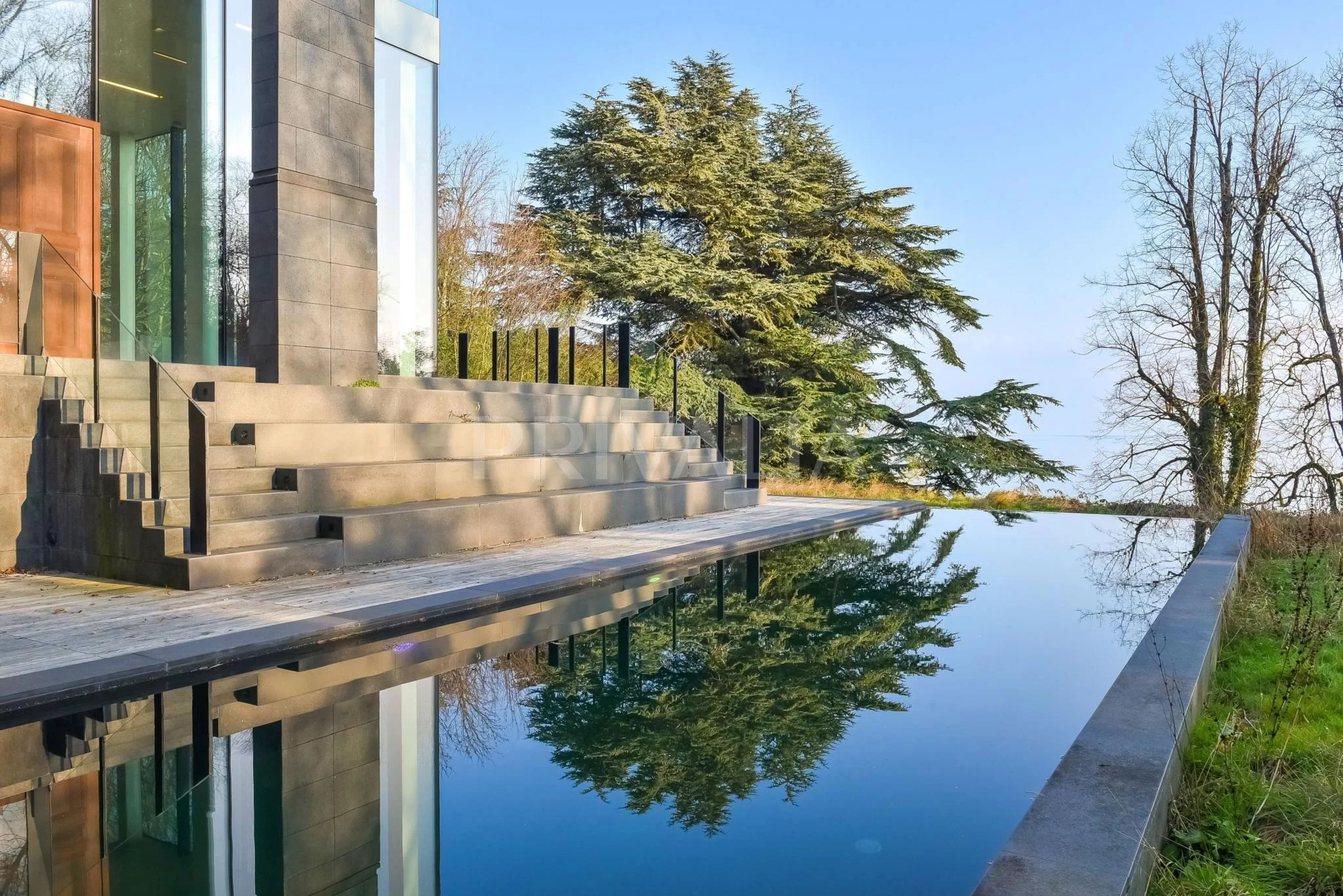 Contemporary waterfront estate with private lake access