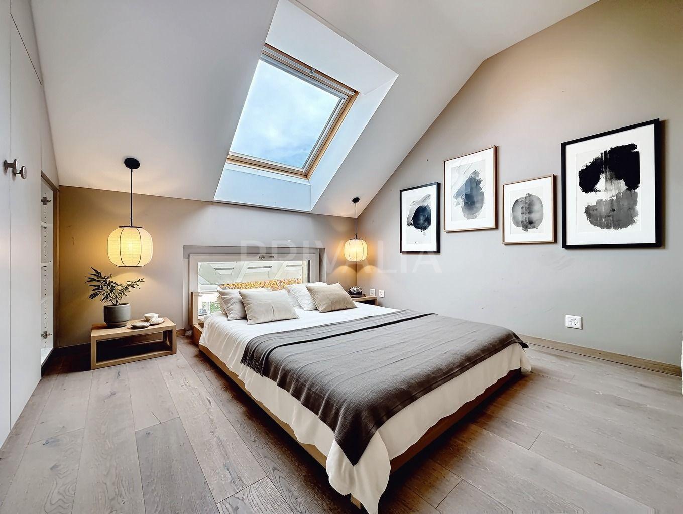 PrivaliaAttique en duplex Minergie de 135 m² avec balcon et cheminée à Mies